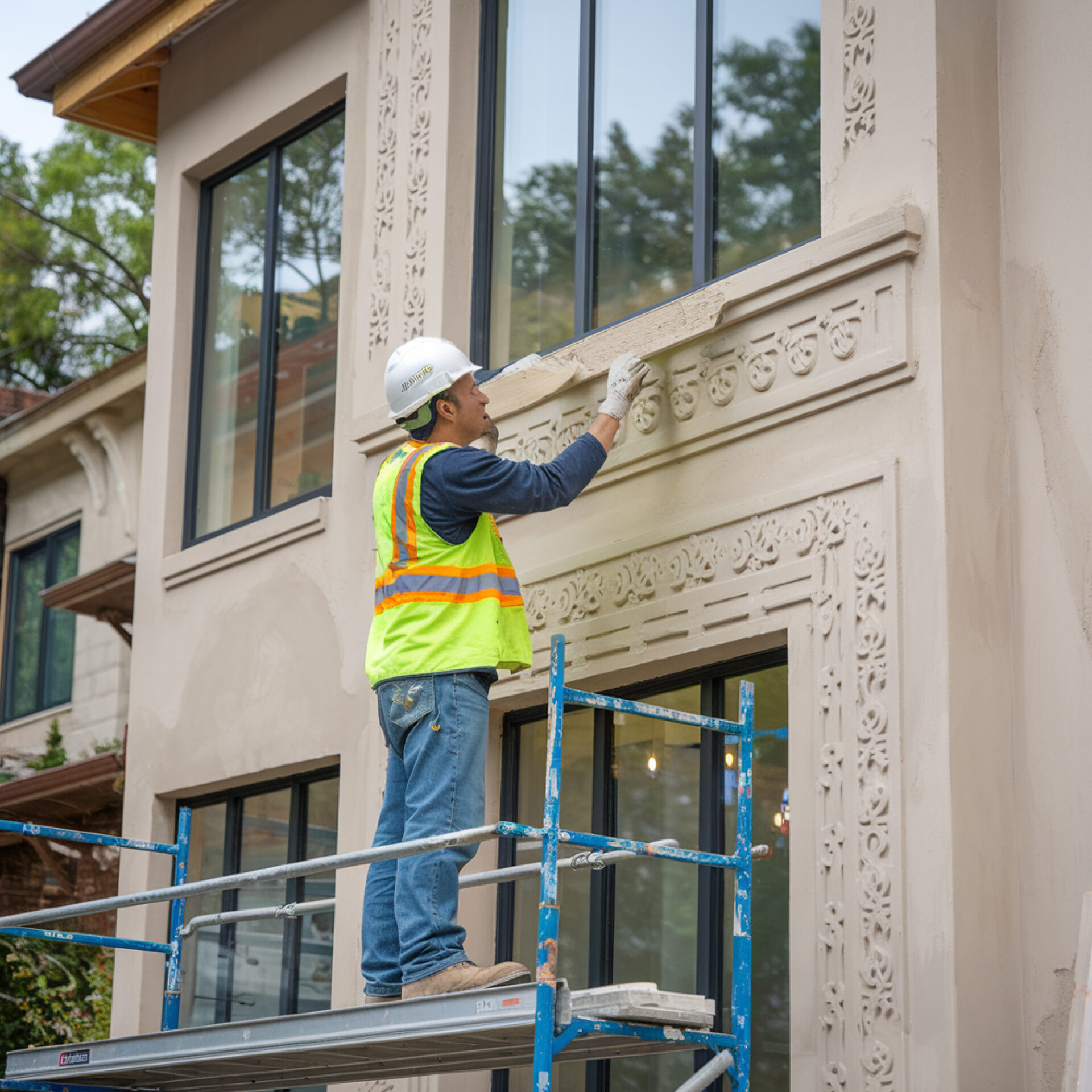 construction-worker-is-working-building-with-ladder